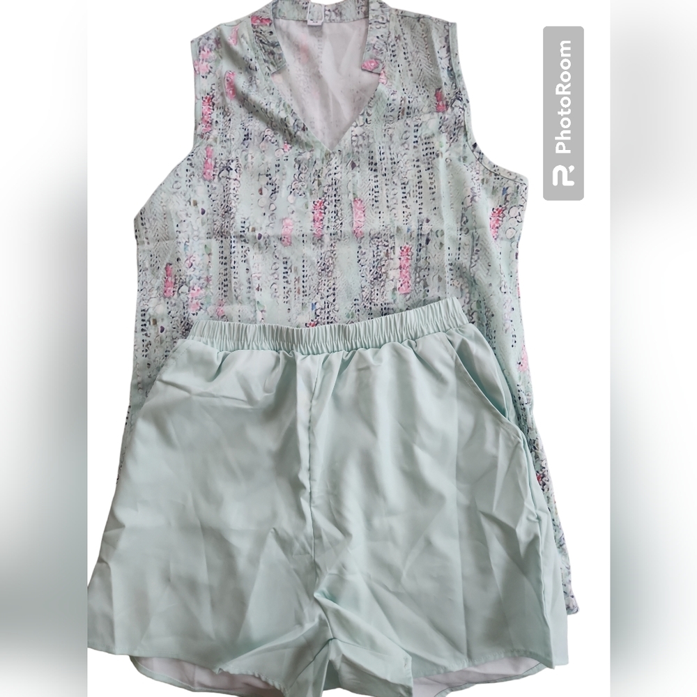 Size xs 2 peice outfit short and sleeveless shirt mint color